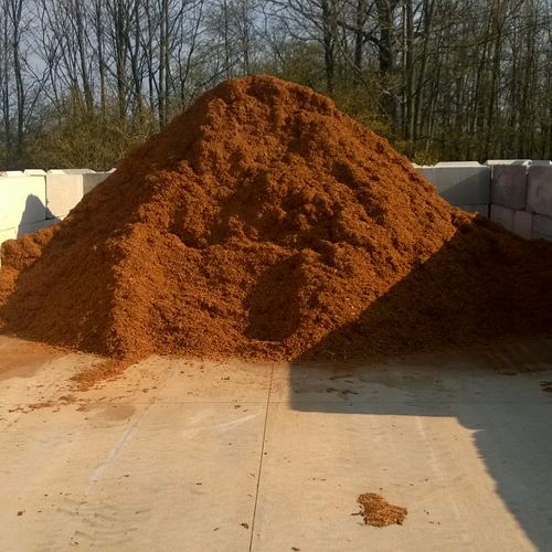Brown hardwood mulch pile in JB's bay